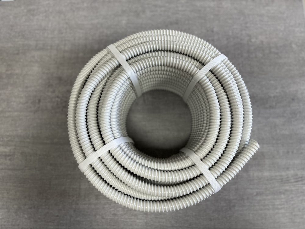 Grey spiral PVC hose coil with straps