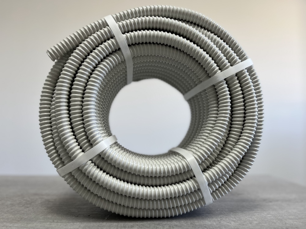 Grey spiral PVC hose coil, front view